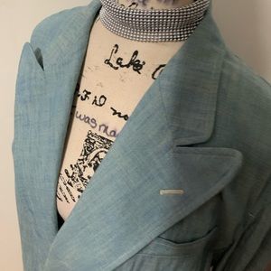 Polo Ralph Lauren denim jacket with ornate gold polo cap riding hat on b…